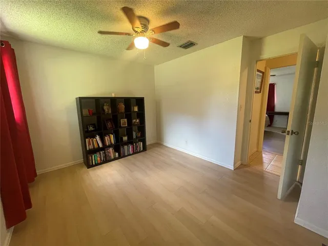 a view of a livingroom with a bookshelf