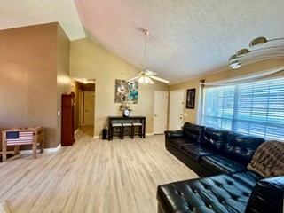 528 Windy Road Mount Juliet, TN 37122 - Photo 2 of 14 a living room with furniture and a chandelier