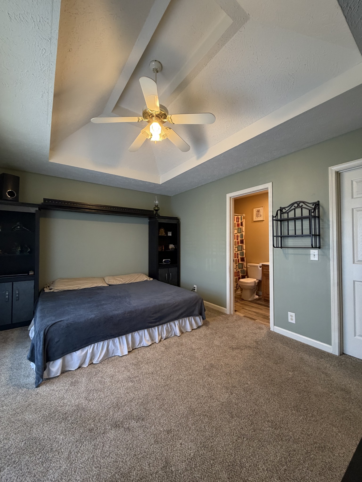 528 Windy Road Mount Juliet, TN 37122 - Photo 7 of 14 a room with a large bed and a ceiling fan