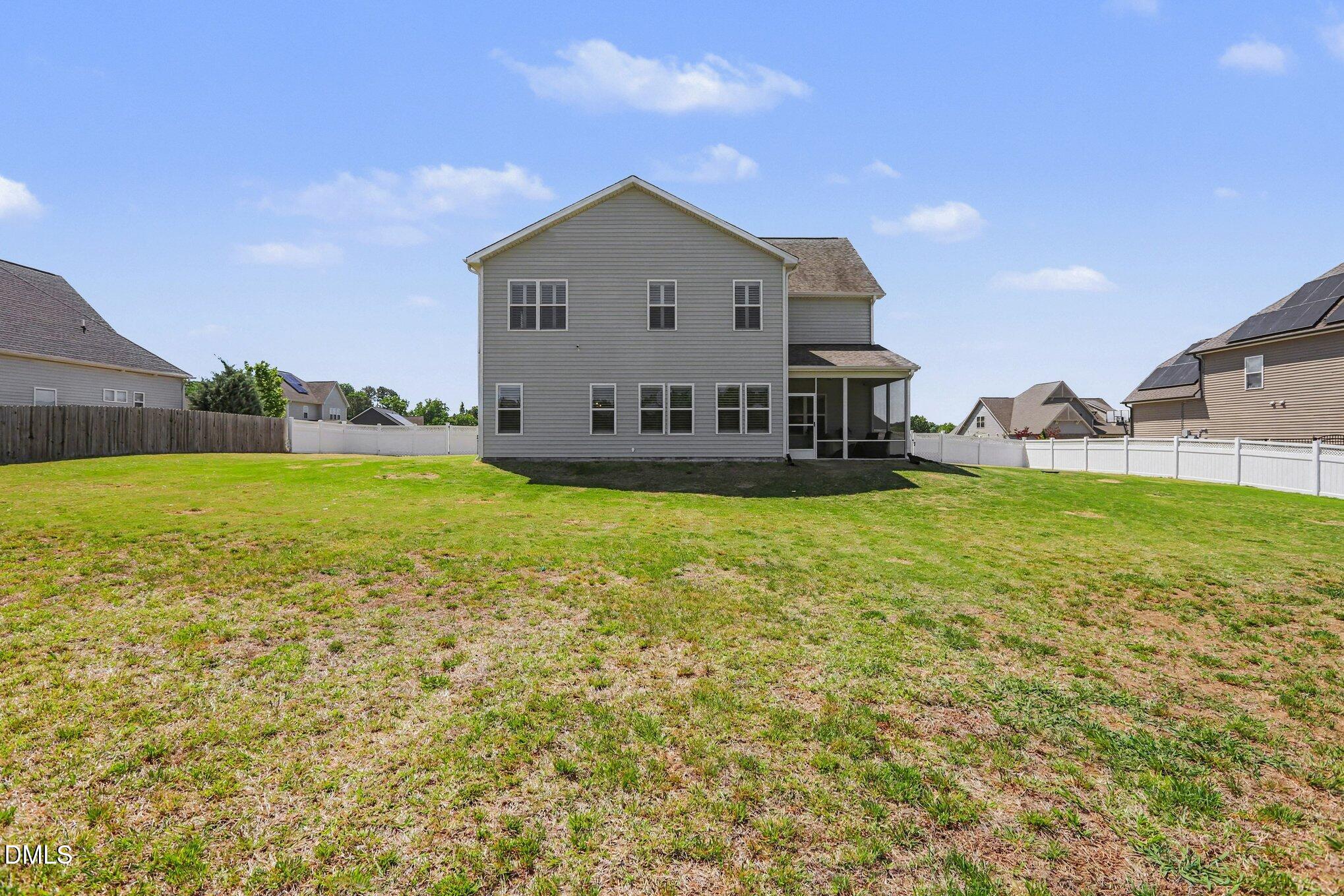 432 Seabring Lane Raleigh, NC 27603 - Photo 25 of 29 a view of a house with a yard and sitting area