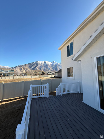 1142 West 220 North Mapleton, UT 84664 - Photo 20 of 26 Wooden terrace featuring a fenced backyard and a mountain view