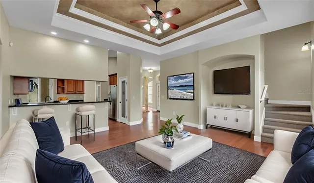 a kitchen with stainless steel appliances granite countertop a refrigerator and a stove