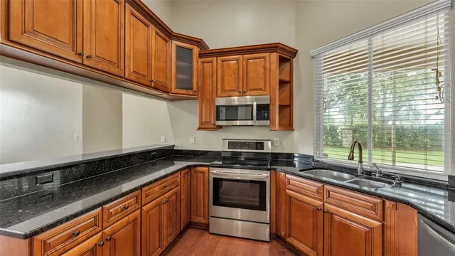 a bathroom with a shower and a sink