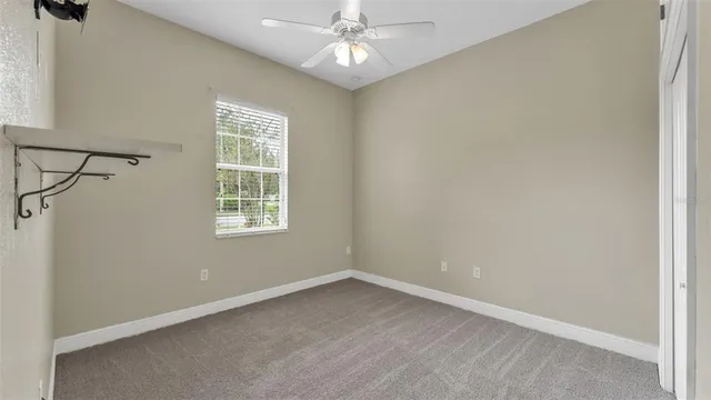 a house view with a sitting space and garden
