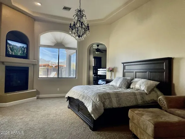 a room with a bed and window