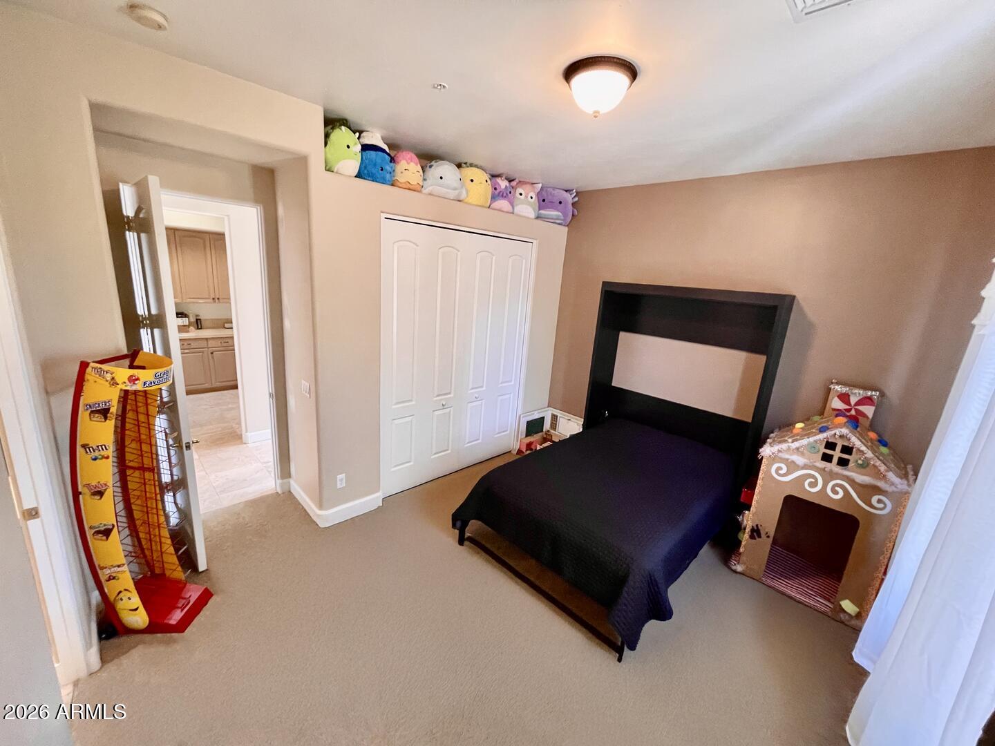 12198 East Doubletree Ranch Road Scottsdale, AZ 85259 - Photo 36 of 70 a living room with furniture and a flat screen tv