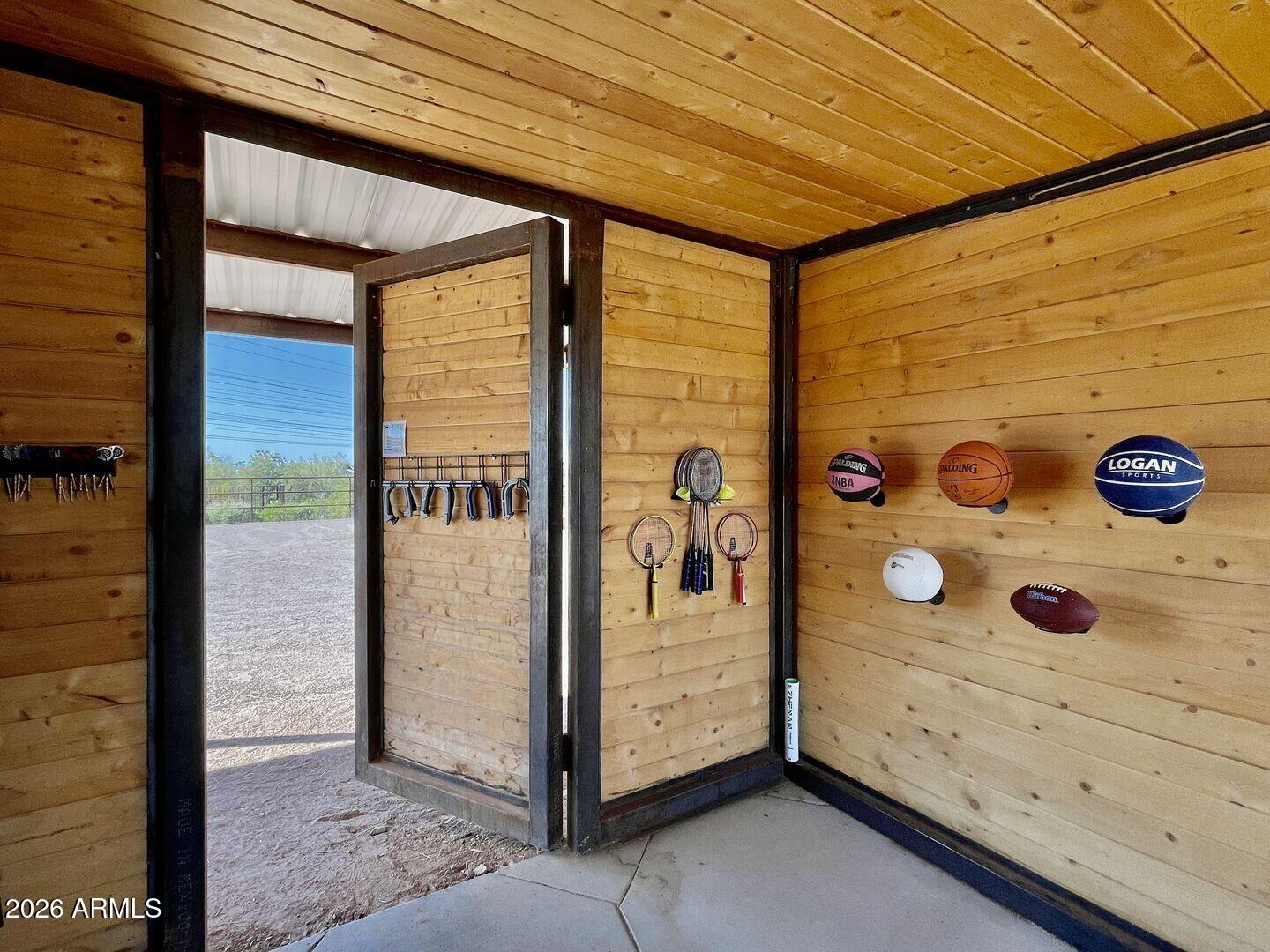 12198 East Doubletree Ranch Road Scottsdale, AZ 85259 - Photo 63 of 70 a view of a door and chair in the room