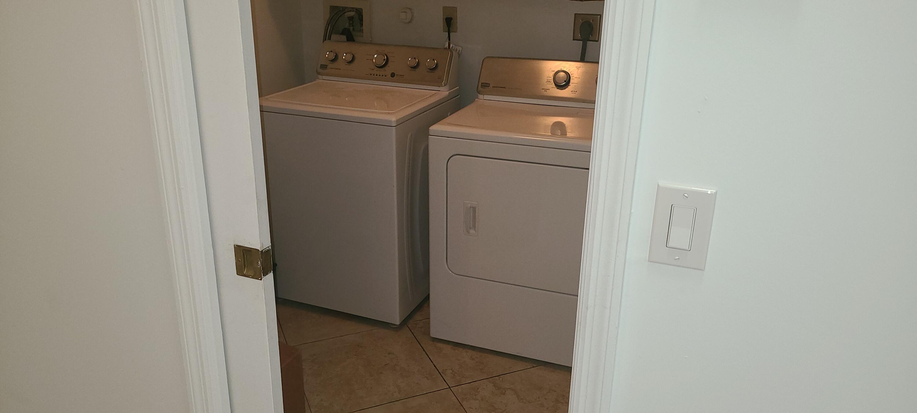 11105 Rios Road Boca Raton, FL 33498 - Photo 23 of 31 a utility room with dryer and washer