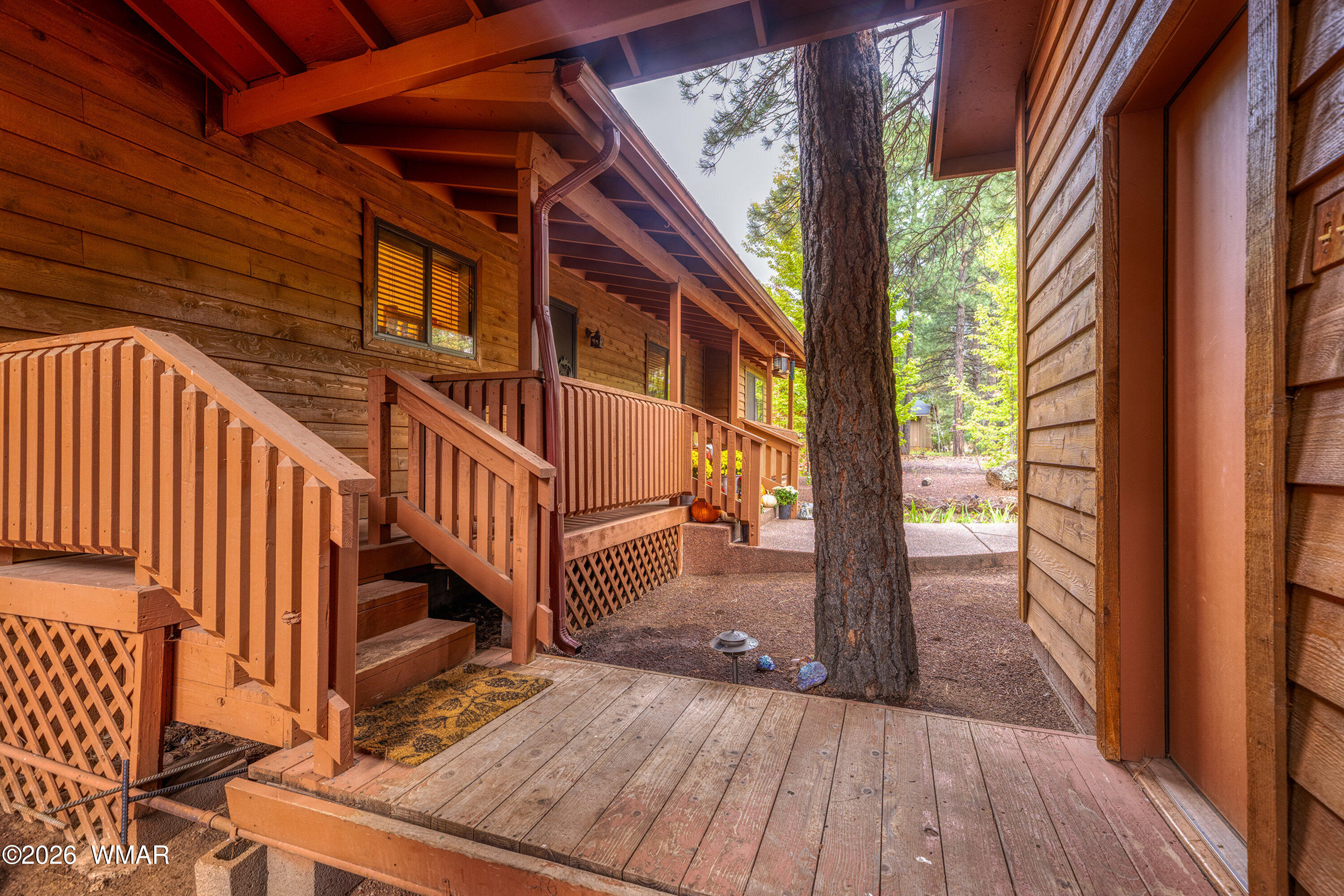 5155 Buck Springs Road Pinetop, AZ 85935 - Photo 5 of 37 a view of balcony with wooden floor