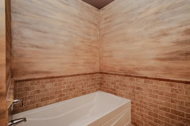 a bathroom with a bathtub