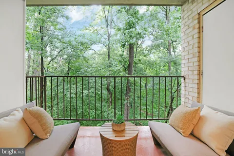 a view of a two chairs in the deck
