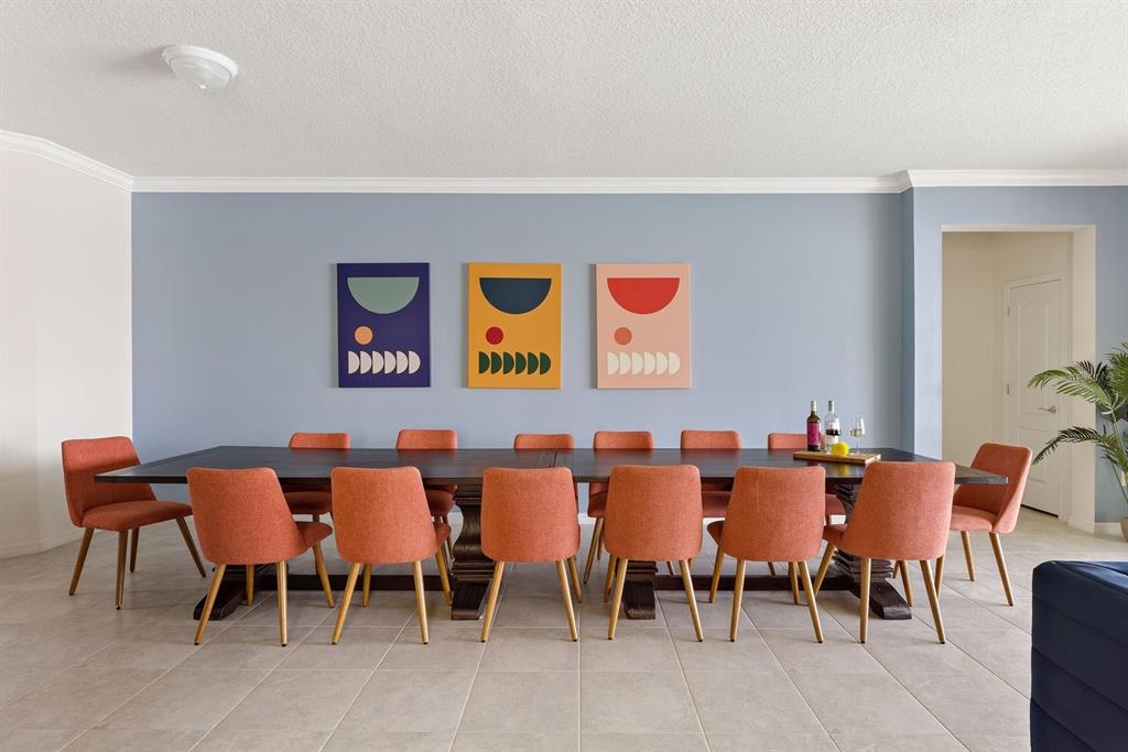 1864 Nice Court Kissimmee, FL 34747 - Photo 7 of 35 a group of people sitting in a living room