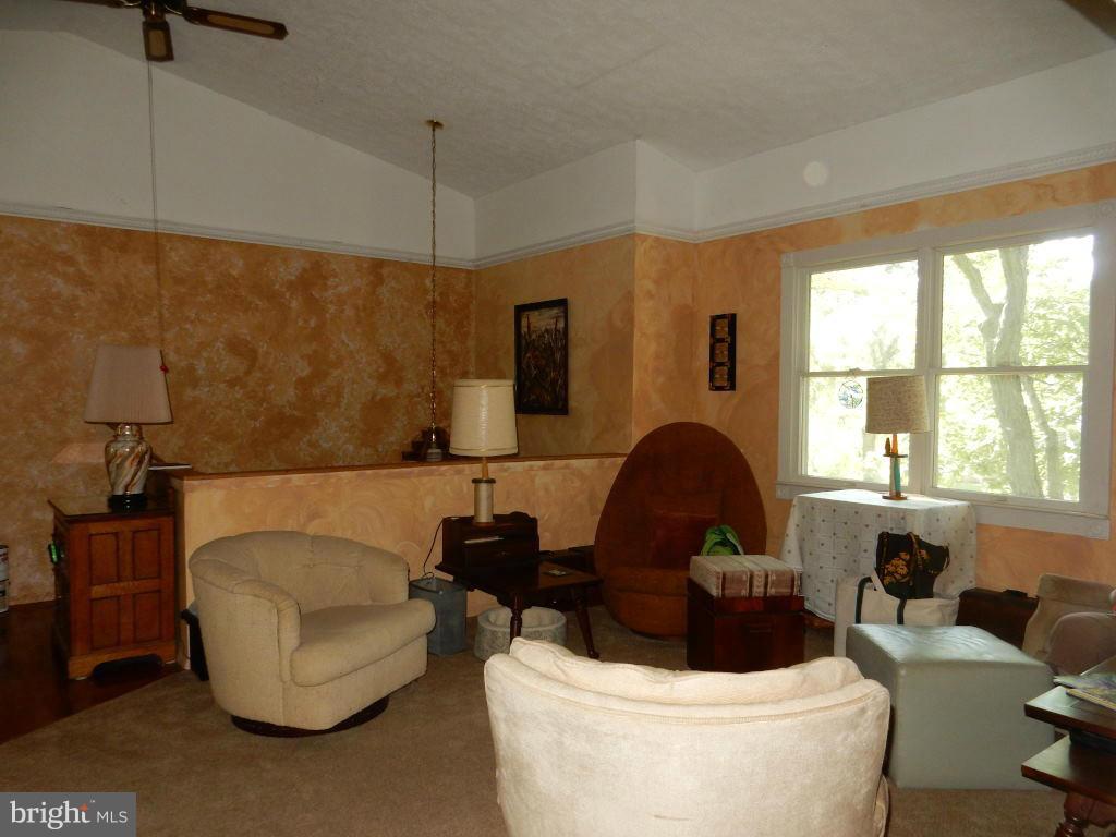 105 Haverhill Road Joppa, MD 21085 - Photo 3 of 21 a living room with furniture and a window