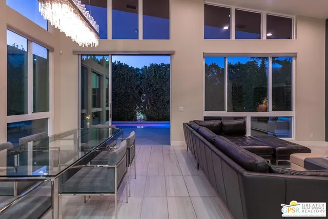 a view of swimming pool with outdoor seating