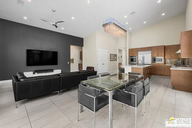 a view of a dining room with furniture window and outside view