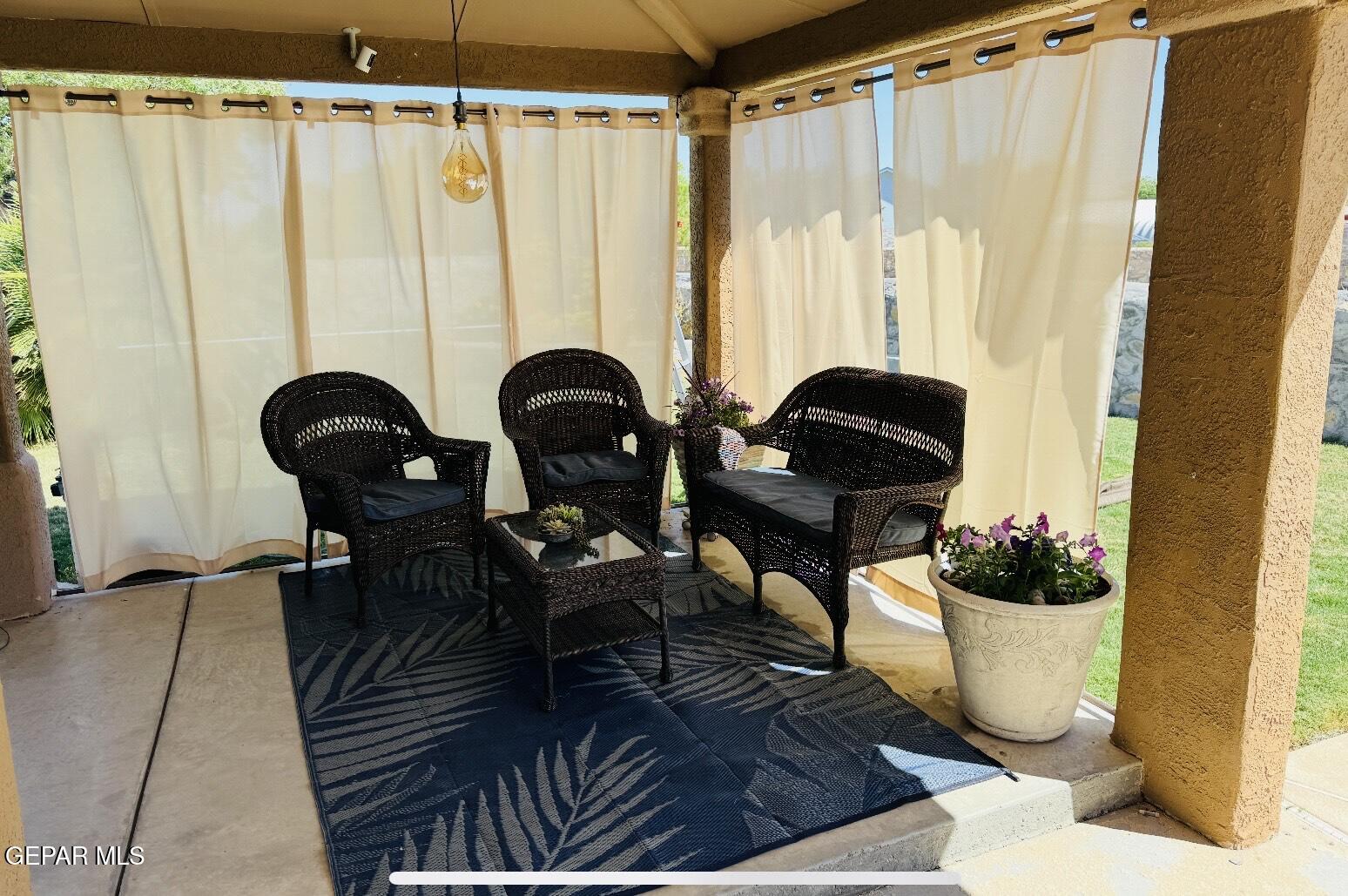 4621 Esparza Lane El Paso, TX 79934 - Photo 22 of 24 a living room with furniture and a window