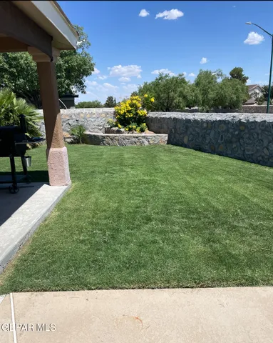 a view of outdoor space and yard