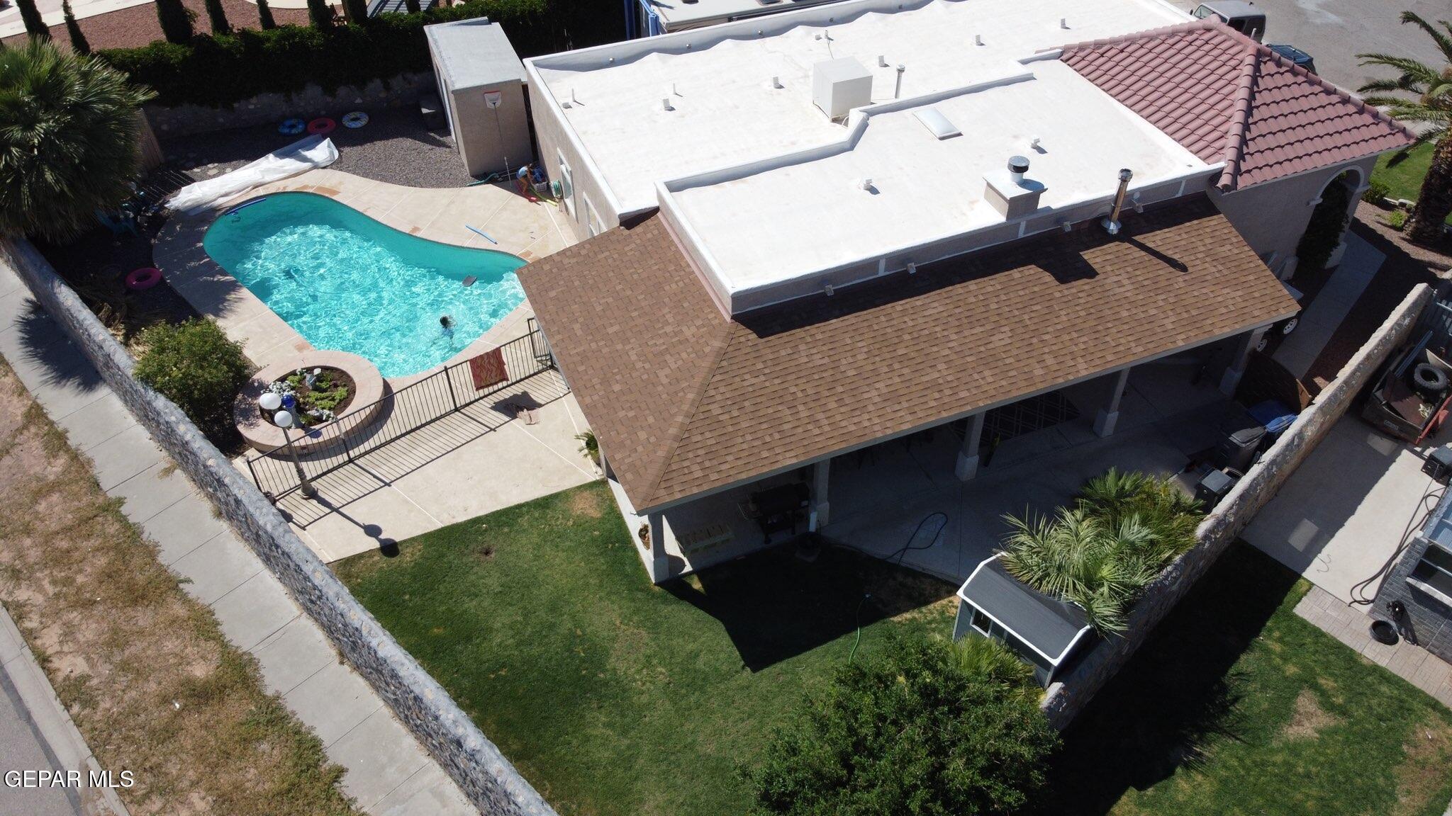 4621 Esparza Lane El Paso, TX 79934 - Photo 3 of 24 an aerial view of a house with a yard