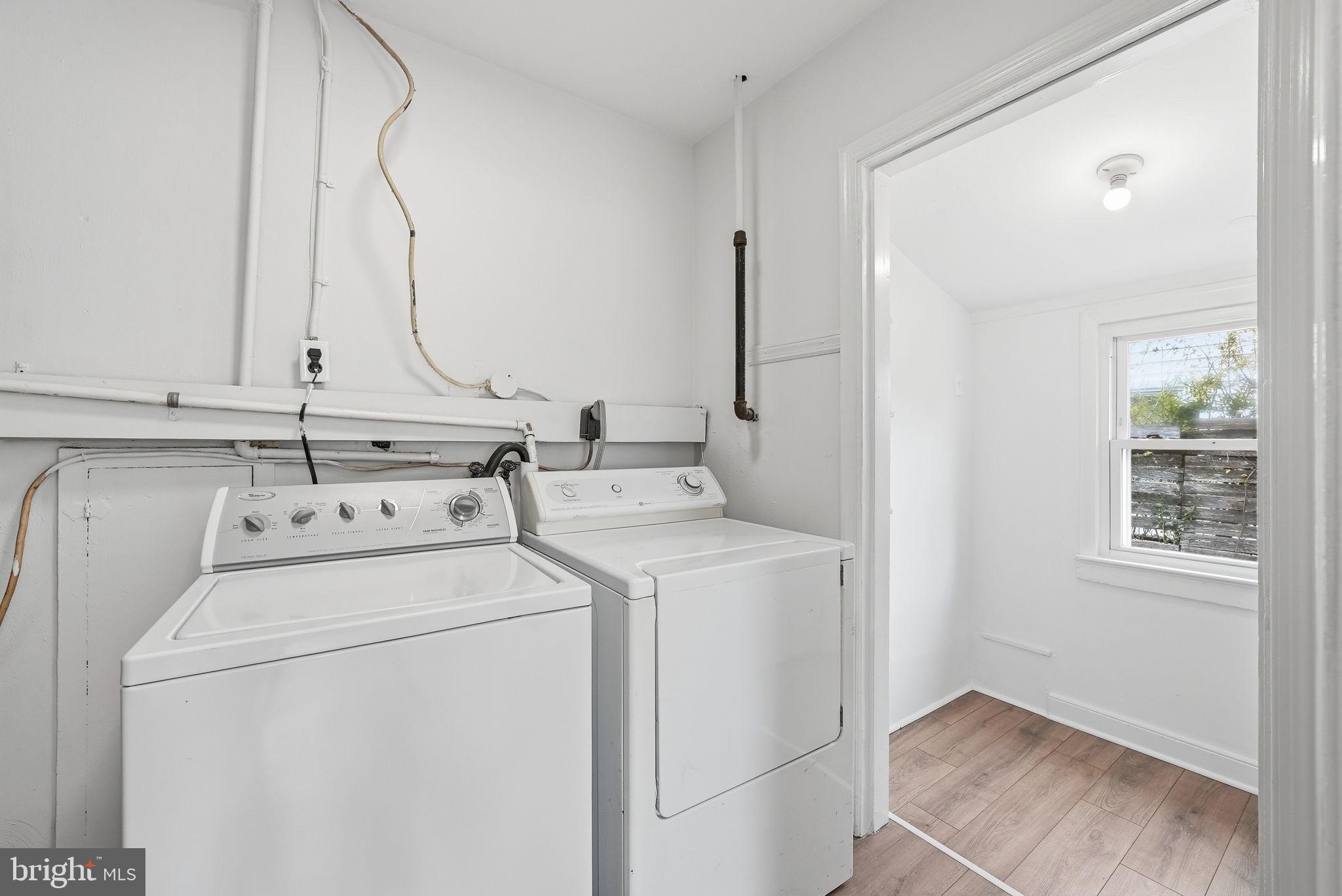 12304 Livingston Street Silver Spring, MD 20902 - Photo 11 of 20 a utility room with dryer and washer