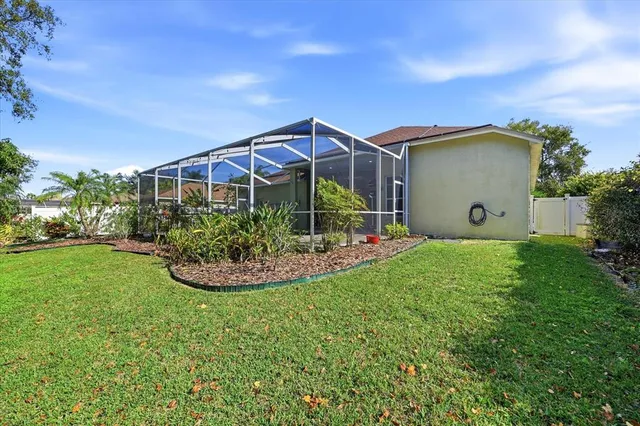 a view of a tiny house with a yard