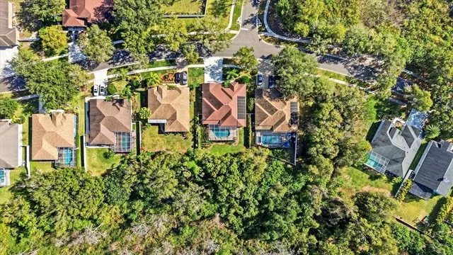 front view of a multi story building with a yard