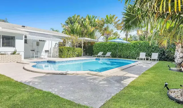 a view of outdoor space yard and swimming pool
