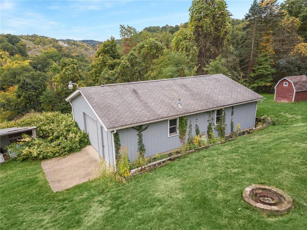 1020 Monaca Road Monaca, PA 15061 - Photo 18 of 25 BONUS!!! There is direct access (via Gillin Dr) to this 2 story outbuilding (once a meat processing shop on lower level) and rear yard.