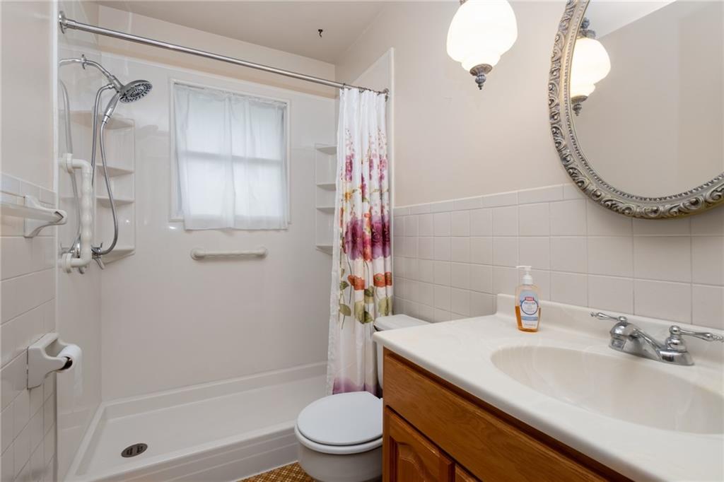 1020 Monaca Road Monaca, PA 15061 - Photo 8 of 25 Full bath on main level features a walk-in shower