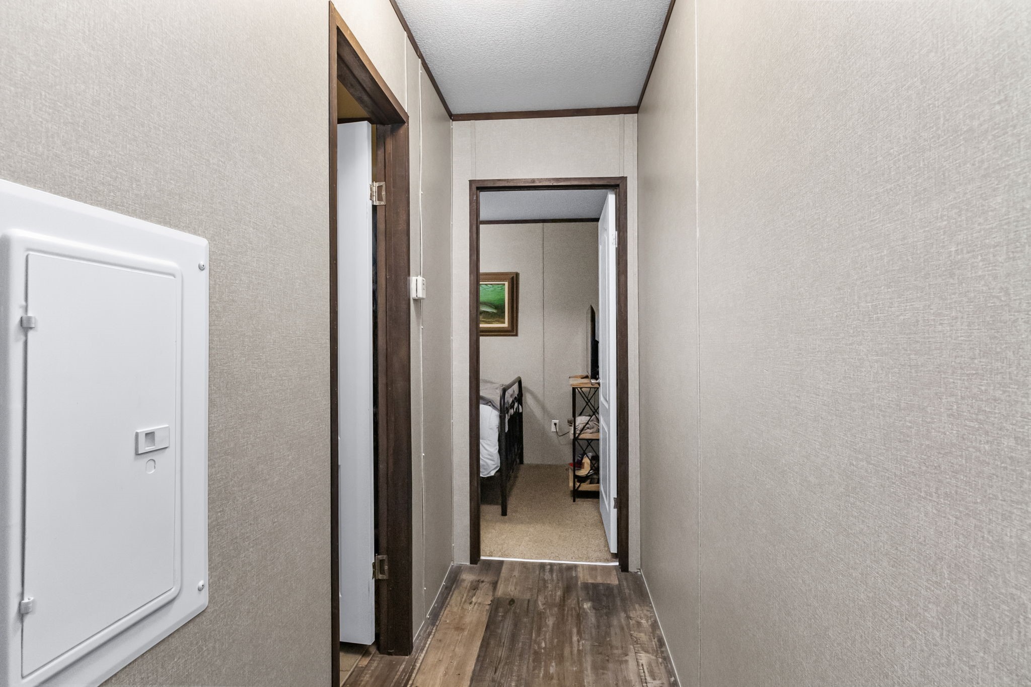 275 Bryan Street Zavalla, TX 75980 - Photo 13 of 24 a view of a livingroom from a hallway