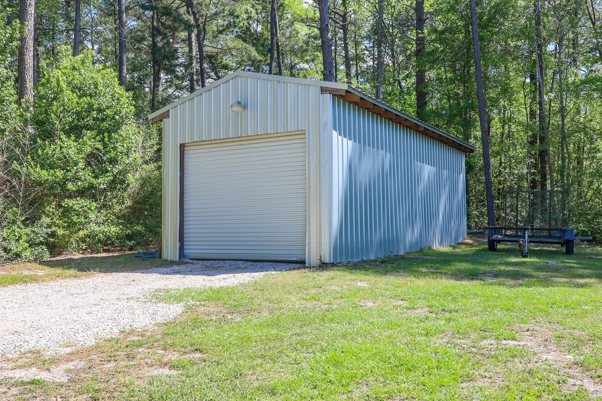 275 Bryan Street Zavalla, TX 75980 - Photo 20 of 24 a house with a yard