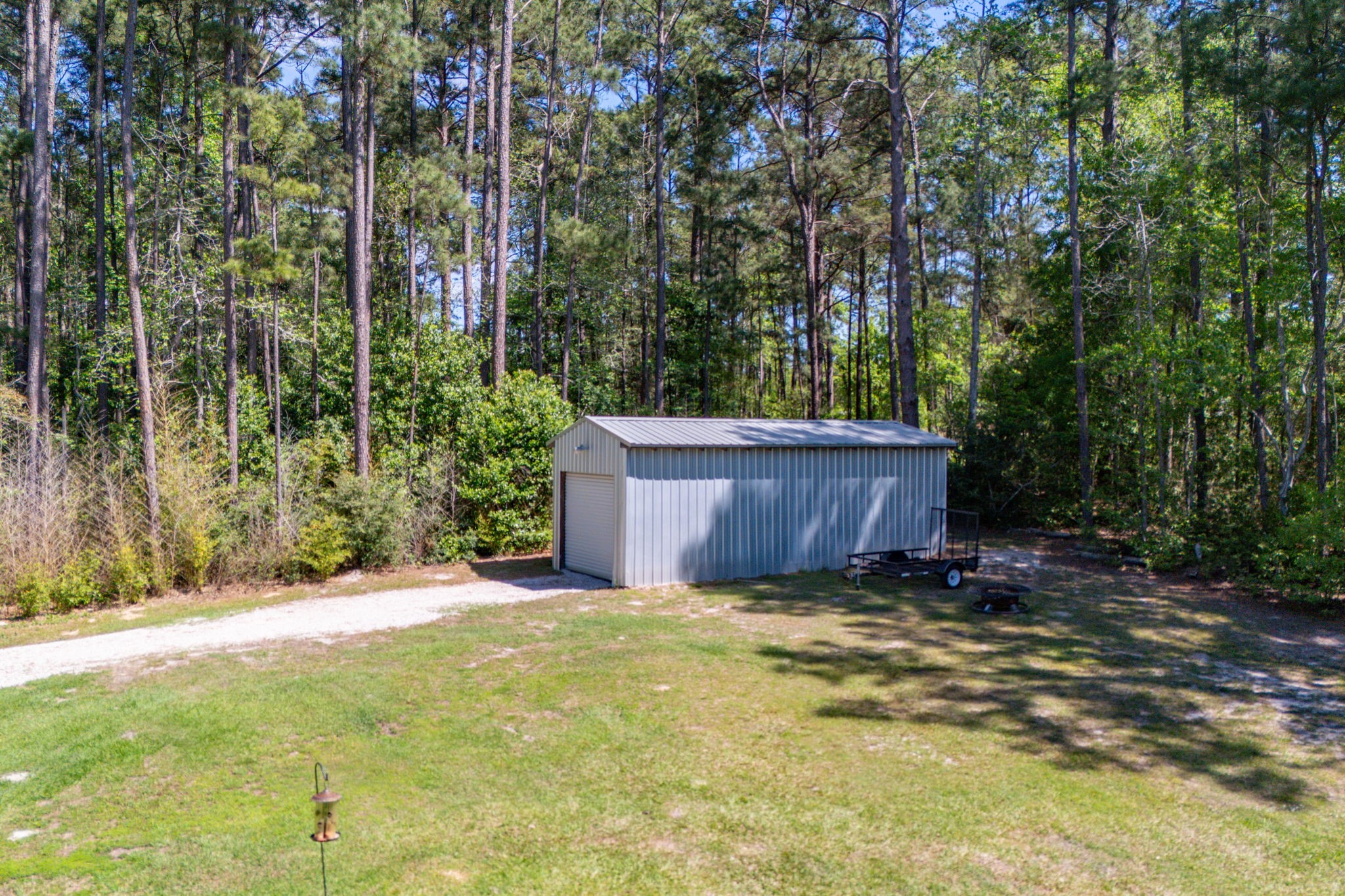 275 Bryan Street Zavalla, TX 75980 - Photo 22 of 24 a view of a back yard