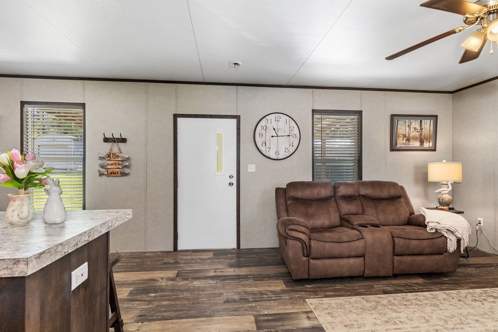 275 Bryan Street Zavalla, TX 75980 - Photo 5 of 24 a living room with furniture and a window