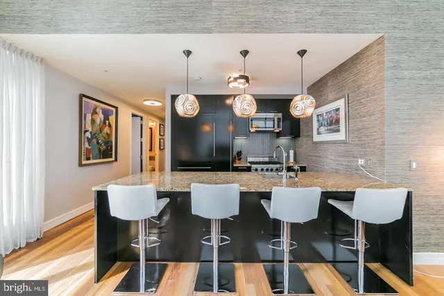 a kitchen with a stove and a sink