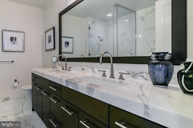 a bathroom with a bathtub and shower