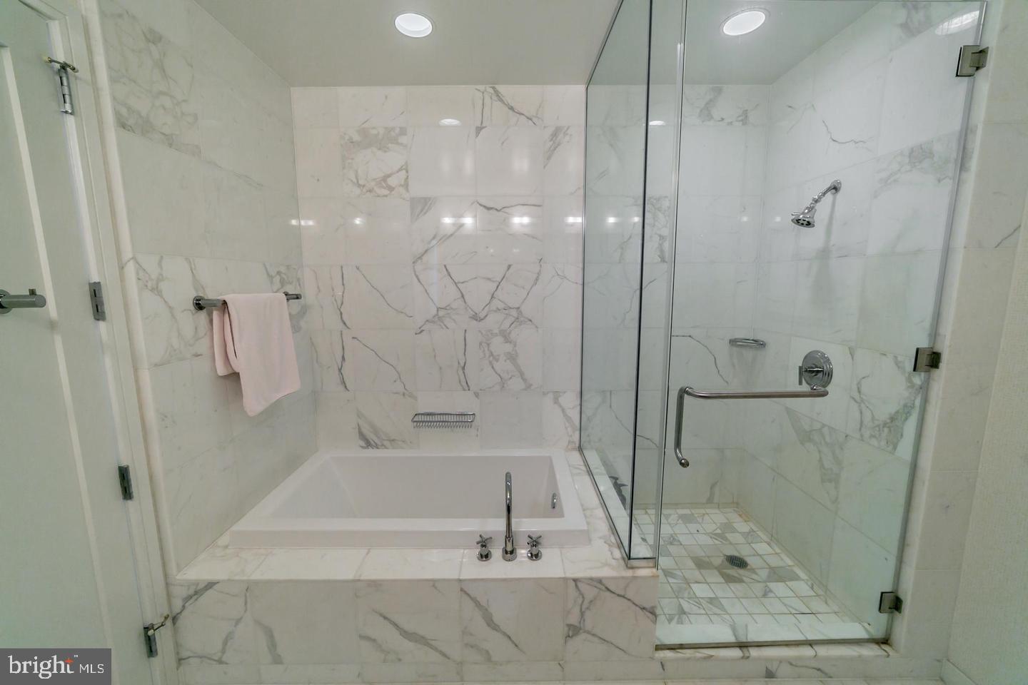 1414 South Penn Square, Unit 45A Philadelphia, PA 19102 - Photo 21 of 23 a bathroom with a bathtub and shower