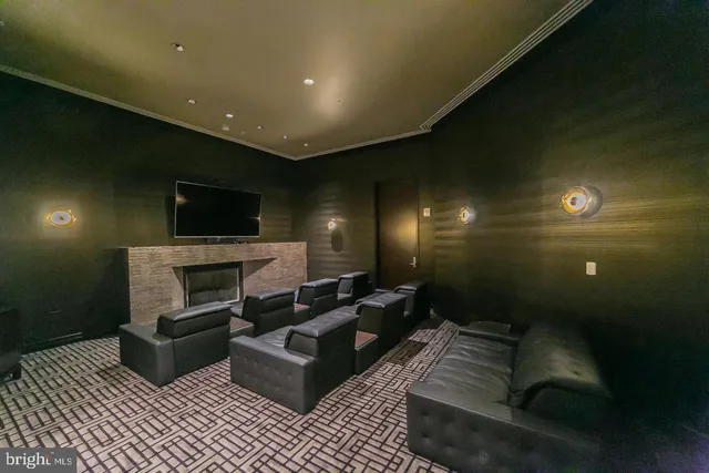 a view of a lobby with black carpet