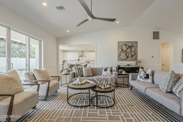 a bathroom with a shower and a sink