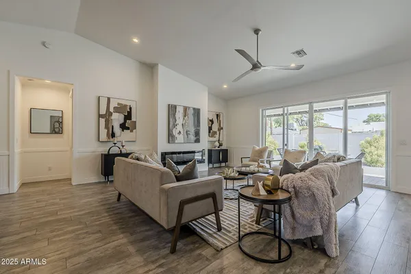 a living room with a couch and a view of living room