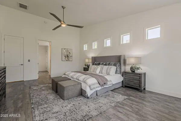an aerial view of a house with a swimming pool