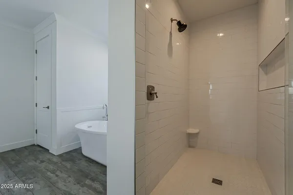 an aerial view of a house with a swimming pool