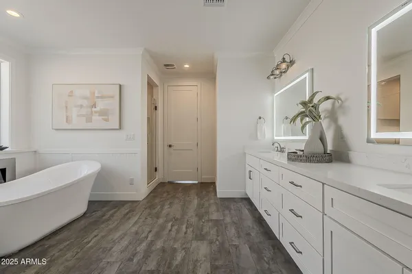 an aerial view of a house with a swimming pool