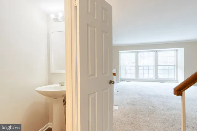 a bathroom with a tub and a sink