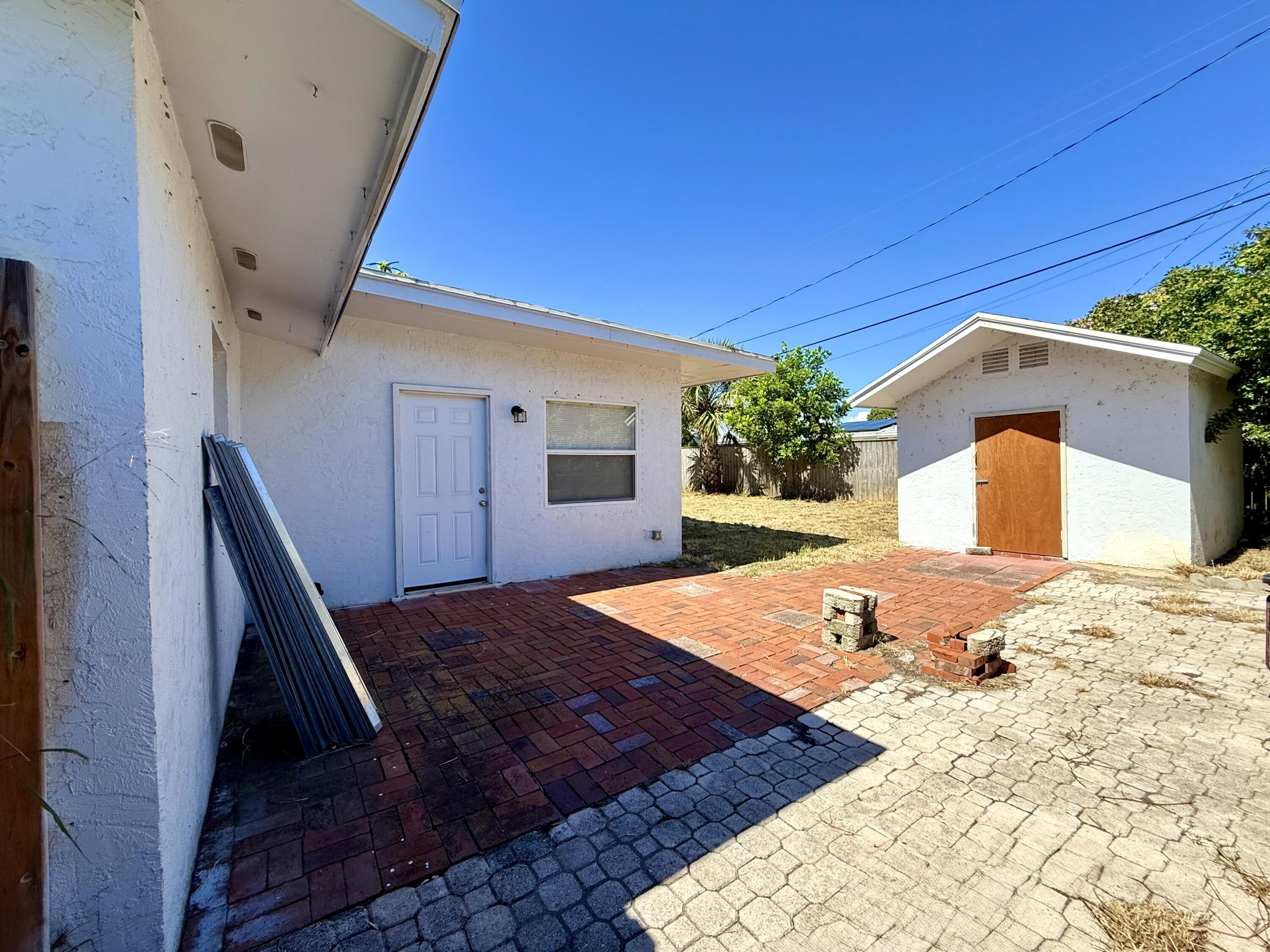 1455 Northeast Silver Maple Way Jensen Beach, FL 34957 - Photo 44 of 55 a view of a bedroom