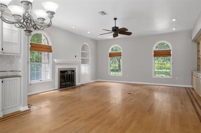 a view of entryway with wooden floor and door