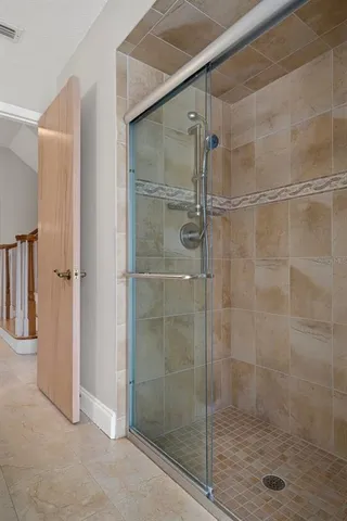a view of wooden floor and windows in a room