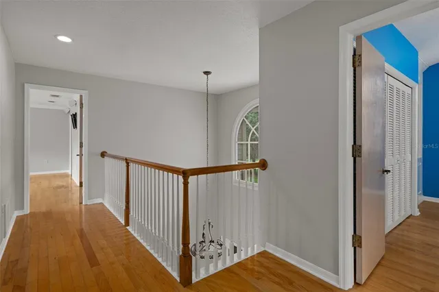 a view of a house with a yard and garage
