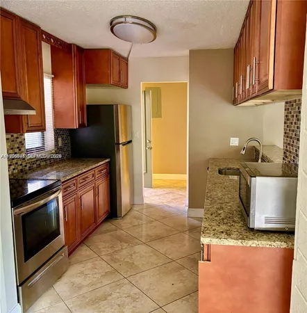 $2,200 | 3100 North Pine Island Road, Unit 103, Sunrise, FL 33351
