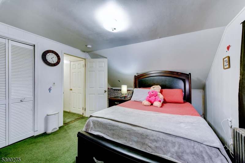 910 Wootton Street Boonton, NJ 07005 - Photo 11 of 21 a bedroom with a bed and a closet