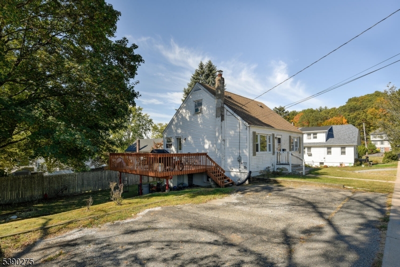 910 Wootton Street Boonton, NJ 07005 - Photo 18 of 21 a front view of a house with a yard