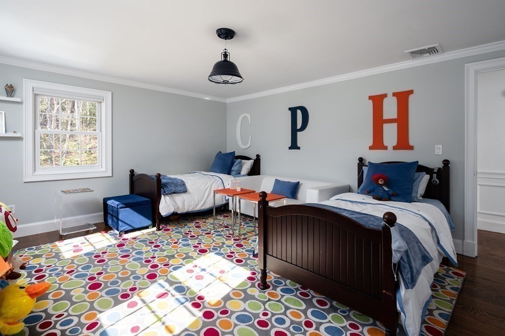 3 Brewer Way Hingham, MA 02043 - Photo 20 of 36 a bedroom with two beds and a lamp